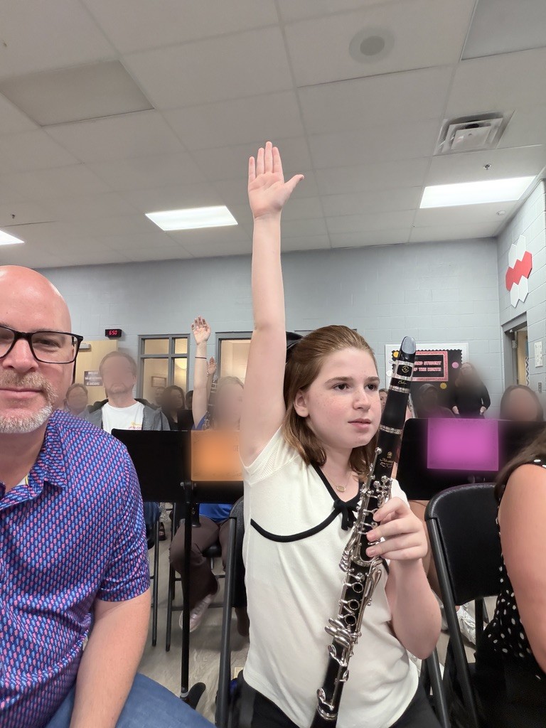 Claudia at band night, 1 October. First year, first instrument, first hand in the air.